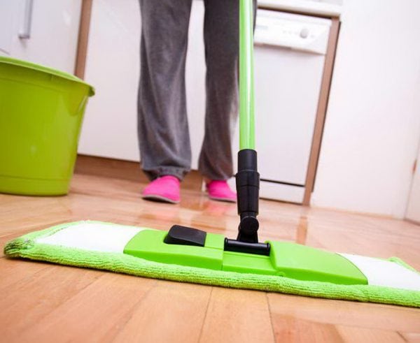 Duster washing a wooden floor