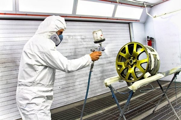 Application of metallic paint on a car disc