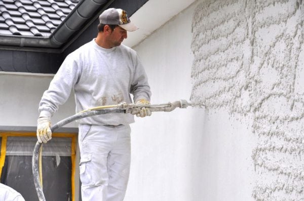 Mechanized application of putty mixture on the wall