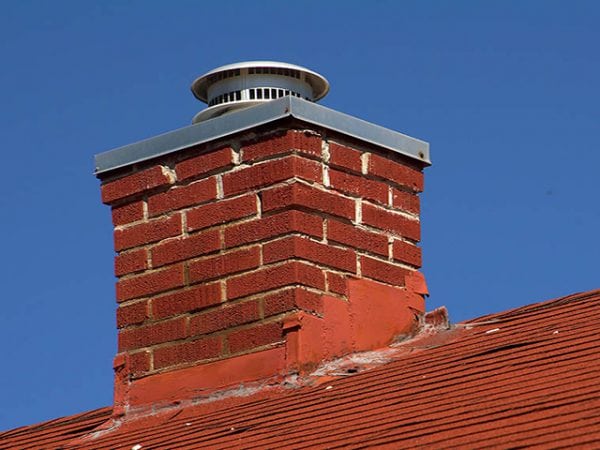 Peinture de cheminée d'une maison privée