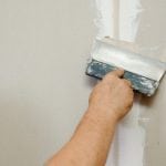 Puttying joints of drywall sheets