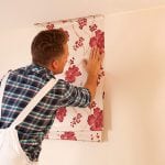 Wallpapering on a painted surface