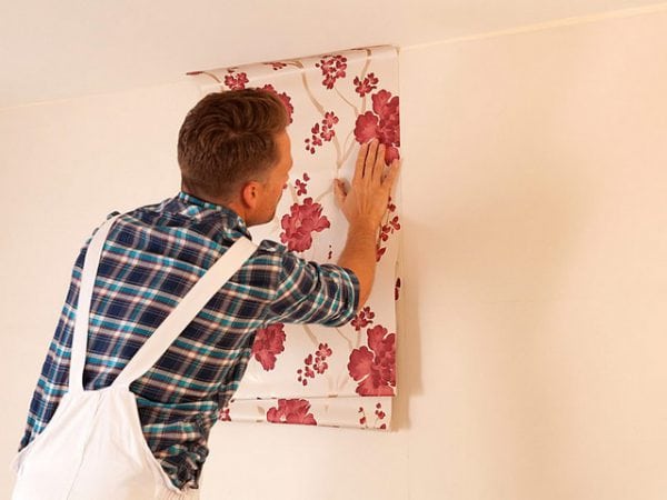 Wallpapering on a painted surface