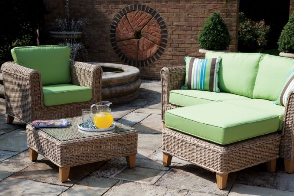 Rattan chairs with pistachio pillows