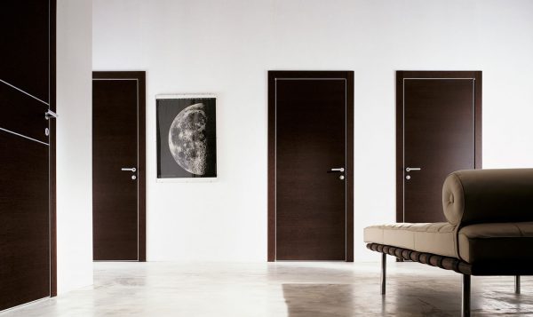 Dark doors against the background of light walls