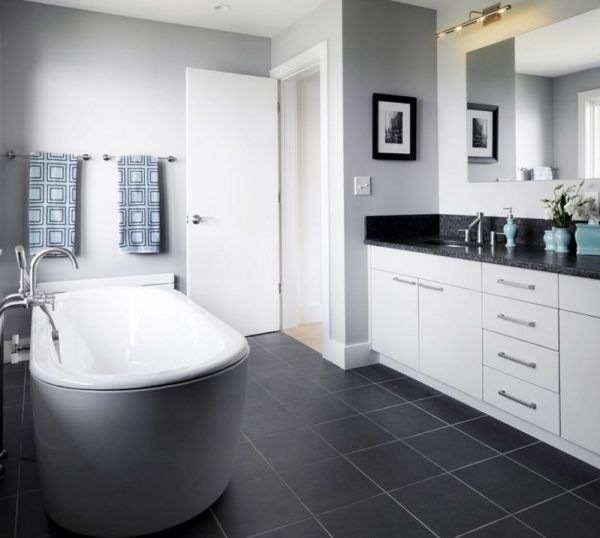 Black floor in a bright bathroom