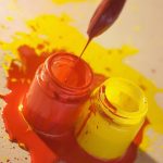 Mix of red and yellow paint