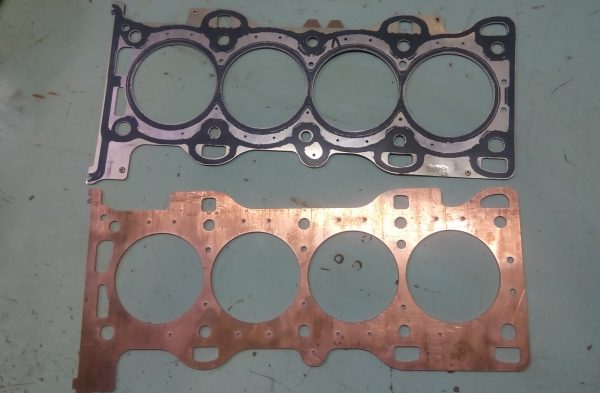 Bimetal gaskets for engine