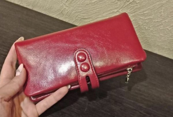 Cleaning a red wallet