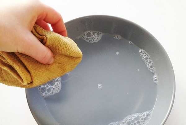 Cleaning the wallet with soap and water