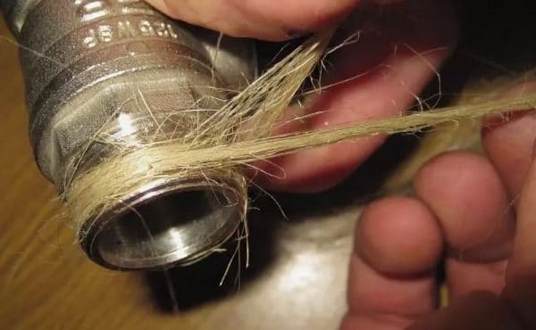 Winding flax onto threaded joints