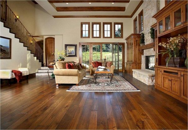 Wooden furniture and massive parquet in the living room