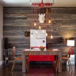 Wooden wall in the interior of the kitchen