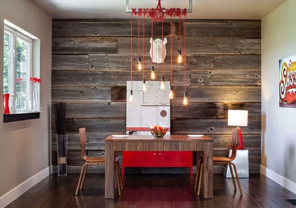 Wooden wall in the interior of the kitchen