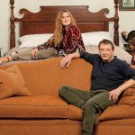 Marat Basharov with his wife in his apartment