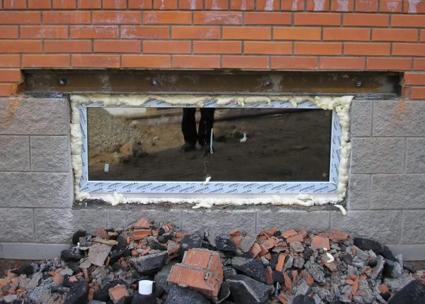 Installation d'une fenêtre au sous-sol