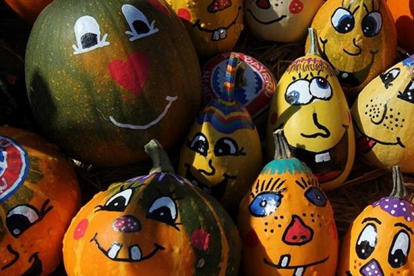 Drawings on pumpkins with watercolor paints