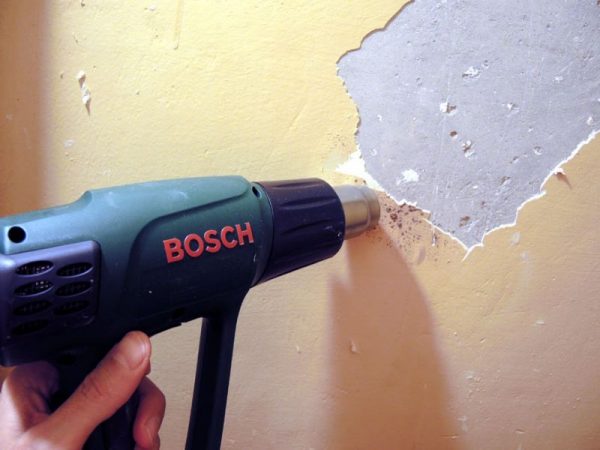 Removing old stucco with a drill