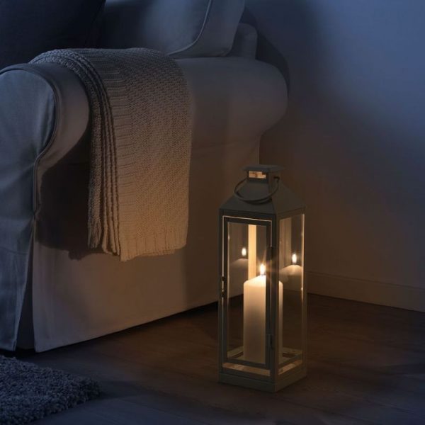 Candle lights in the living room interior