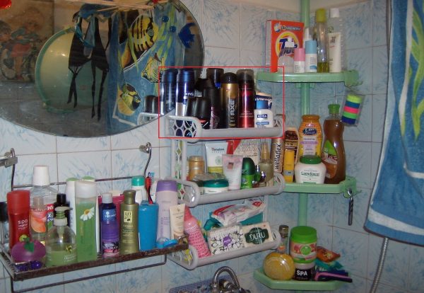 Shelf in the bathroom with makeup