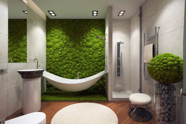 Artificial grass on the wall in the bathroom interior