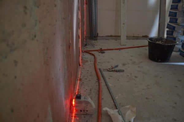 Laser leveling the wall