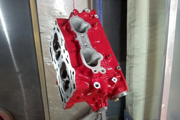 Powder coating of engine parts